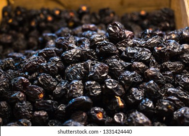 Ajwa dates. Dried dates (fruits of date palm). fruit market selling ajwa dates for iftar 