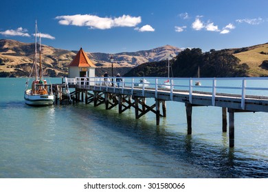 Akaroa Town, New Zealand In Clear Sky