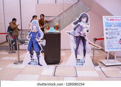 Akihabara, Japan- January 5, 2019: Cardboard cutouts of characters from an anime on display in a store in Akihabara.