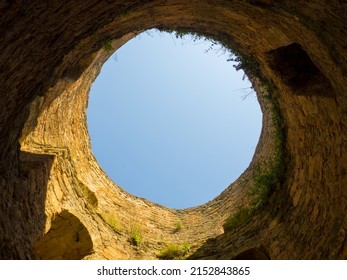 Akkerman fortress. Medieval castle near the sea. Stronghold in Ukraine. Ruins of the citadel of the Bilhorod-Dnistrovskyi fortress, Ukraine. View of the blue sky from the well of the tower. 