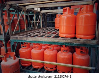 Al Ahsa, Saudi Arabia July 23 2022 : Orange LPG Gas Cylinders Stack At Filling Station 