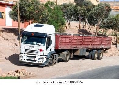Al Haouz Province, Morocco - September 23, 2019: White semi-trailer truck Iveco Stralis AT430 at the interurban road.
