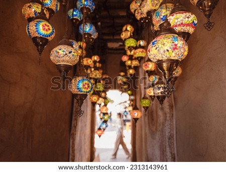 Al seef old historical district with traditional Arabic architecture. Beautiful Traditional Ramadan Light Lamp in shop Dubai Spice Souk.