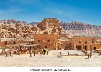 Al Ula old town ruined mud huts with city castle, Medina province, Saudi Arabia - Shutterstock ID 2296502331