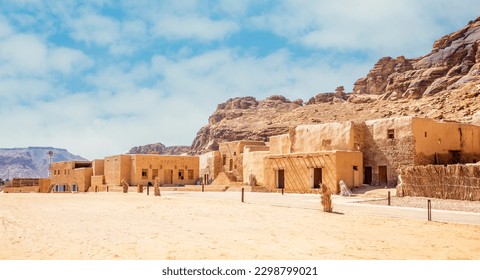 Al Ula old town street with traditional mud huts, Medina province, Saudi Arabia - Shutterstock ID 2298799021