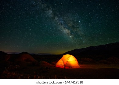 Alabama Hills At Night. Stars, Milky Way, Badlands And Desert Landscape.