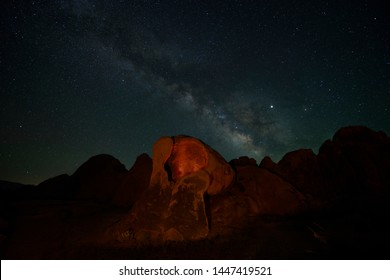 Alabama Hills At Night. Stars, Milky Way, Badlands And Desert Landscape.