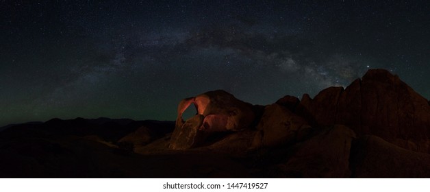 Alabama Hills At Night. Stars, Milky Way, Badlands And Desert Landscape.