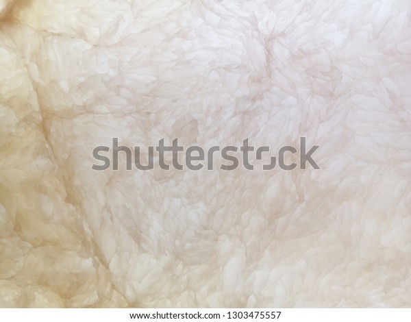 Alabaster stone have crossed\
cut to show pattern and texture for decoration interior,stone\
background