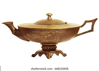 Aladdin bronze magic lamp isolated on white. May Can be used A copper kettle for tea is flat or a lamp.