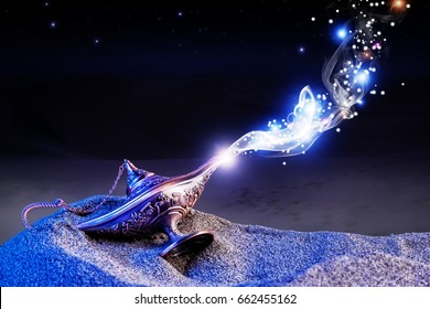 aladdin genie magic lamp on desert sand