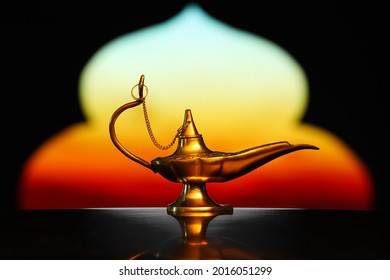 Aladdin lamp of wishes on table - Shutterstock ID 2016051299