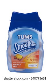 ALAMEDA, CA - DECEMBER 13, 2014: Travel Size Container Of Tums Brand Smoothies Extra Strength Antacid. Naturally And Artificially Flavored. Assorted Fruit Flavors.