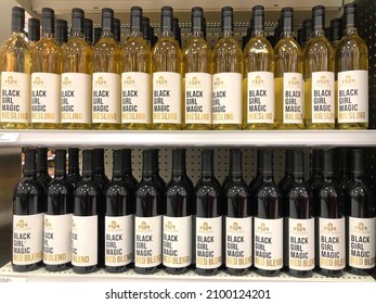 Alameda, CA - Jan 2, 2022: Grocery store shelf with bottles of Black Girl Magic Riesling and Red Blend wines