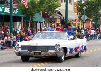 Alameda, CA - July 04, 2018: The Alameda 4th Of July Parade Is One Of The Largest And Longest Independence Day Parade In The Nation. Sponsors Of The Sea West Coast Guard Federal Credit Union Waving.