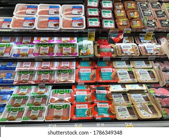 Alameda, CA - July 28, 2020: Grocery Store Refrigerator Section With Rows Of Various Brands Of Plant Based Protein Substitutes Next To Turkey Based Products.