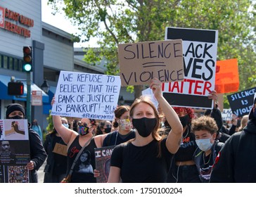 Alameda, CA - June 5, 2020: Protestors participating in  the George Floyd Black Lives Matter protest in Alameda, marching from Encinal High School to City Hall for a rally.
