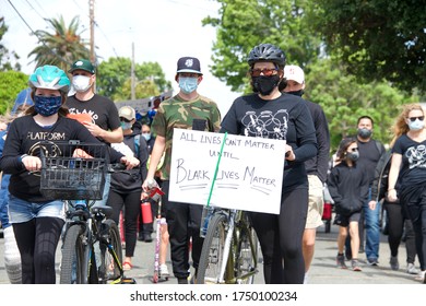 Alameda, CA - June 5, 2020: Protestors Participating In  The George Floyd Black Lives Matter Protest In Alameda, Marching From Encinal High School To City Hall For A Rally.
