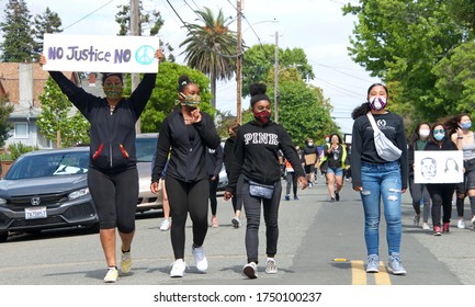 Alameda, CA - June 5, 2020: Protestors Participating In  The George Floyd Black Lives Matter Protest In Alameda, Marching From Encinal High School To City Hall For A Rally.