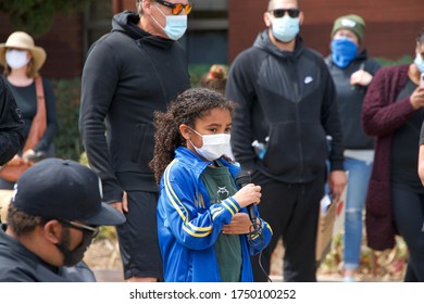 Alameda, CA - June 5, 2020: Protestors Participating In  The George Floyd Black Lives Matter Protest In Alameda, Marching From Encinal High School To City Hall For A Rally.