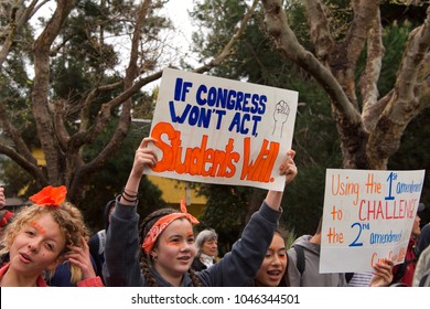 Alameda, CA - March 14, 2018: With calls to End gun violence, no more silence! hundreds of students from Alameda High School participate in a student walkout to protest gun violence.