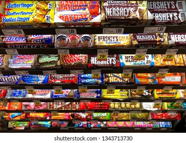 Alameda, CA - March 19, 2019: Many Candy Bars In A Display In The Check Out Line At The Grocery Store, Placed In A Highly Visible Place Where You Will See It To Potentiate Impulse Purchases.