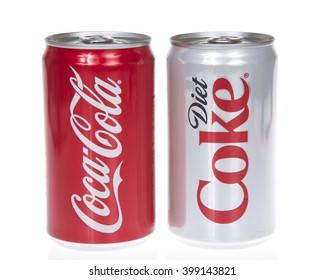 Alameda, CA - March 28, 2016: Coke and diet coke cans Isolated On White Background. Coca-Cola is a carbonated soft drink sold in stores, restaurants, and vending machines worldwide.