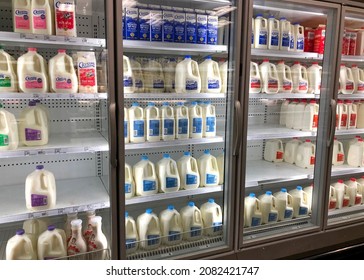 Alameda, CA - Nov 23, 2021: Dairy Isle In Grocery Store With Milk In Various Flavors And Sizes, Many Empty Spaces. Milk Is One Of The Most Popular Items In A Supermarket.