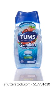 Alameda, CA - November 14, 2016: One Container Of Tums Brand Antacid Berry Fushion Smoothies On A White Reflective Surface.  Extra Strength, Goes To Work In Seconds.