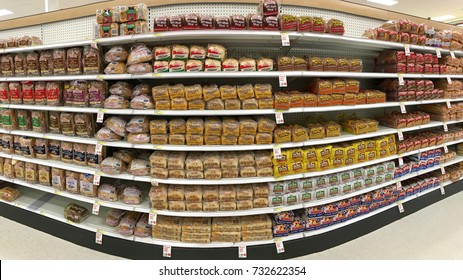 Alameda, CA - October 10, 2017: Grocery Store Aisle With Packages Of Various Brands Sliced Bread.