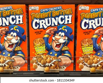 Alameda, CA - Sept 7, 2020: Grocery store shelf with boxes of Cap'n Crunch's Peanut Butter Crunch.