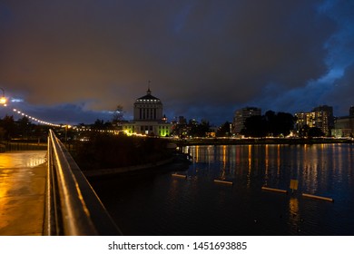 Alameda County Courthouse With Lake Merritt In A Foreground At Night Time, View From A Bridge