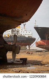 Alang, India, September 2008. Large Tonnage Cargo Ships Stranded On The Beach Waiting To Be Scrapped.