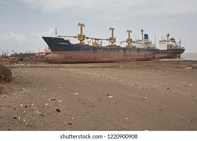 Alang, India, September 2008. Large Tonnage Cargo Ship Stranded On The Beach Waiting To Be Scrapped.