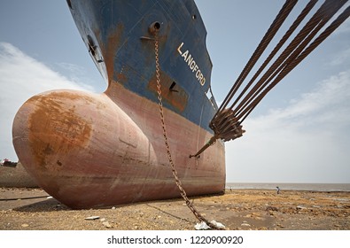 Alang, India, September 2008.Close Up Front View Of A Large Tonnage Cargo Ship Stranded On The Beach Waiting To Be Scrapped.