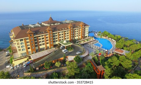 ALANIA - AUG 16, 2015: Hotel Utopia World On Top Of Hill Near Sea At Summer Sunny Day. Aerial View Videoframe. Hotel Utopia World Is A 5-star Resort With Total Area Of About 100000sq.m.