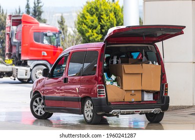 Alanya,  Turkey – April 12 2021:  Station Wagon With Open Trunk Stands Prepared For Unloading Boxes On The Parking Lot