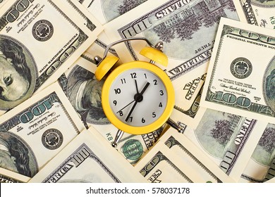 Alarm Clock And Dollars. Time Is Money.