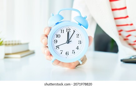 Alarm Clock In Hand. Time Management. Time Take Action. Deadline Concept.