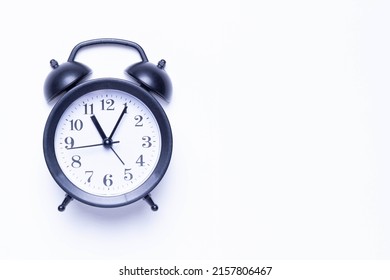 Alarm Clock And Money. Time Is Money. Coins On The Background Of The Clock. Money Leak. Payment Of Time According To The Price.