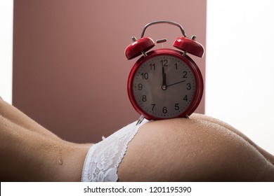 Alarm Clock. Morning. Watch On A Beautiful Elastic Sexy Ass. Fitness Buttocks. Daily Regime. Sex In The Morning. Wife Or Mistress In Bed. White Lingerie And Sperm On The Female Back