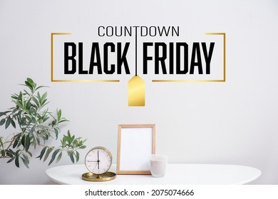 Alarm clock on table in room. Black Friday countdown