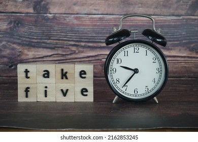 Alarm Clock With Take Five Concept