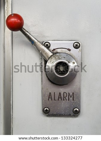 Alarm lever or emergency brake on a train