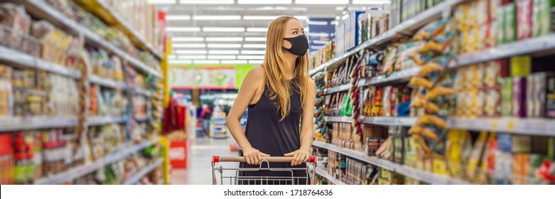 Alarmed Female Wears Medical Mask Against Coronavirus While Grocery Shopping In Supermarket Or Store- Health, Safety And Pandemic Concept - Young Woman Wearing Protective Mask And Stockpiling Food