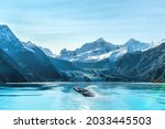 Alaska cruise travel Glacier Bay vacation. Whale watching tour concept for USA holiday destination.