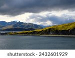 Alaska-Coast of Unalaska Island is an island in the Fox Islands in the west-eastern center of the Aleutian Islands