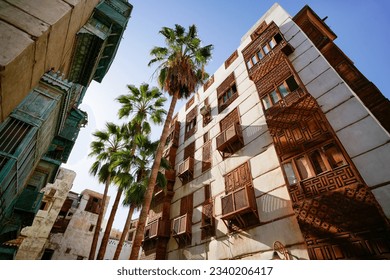 Al-Balad is Jeddah’s historical centre. Founded in the 7th century, it was a wealthy trading port and hub for Mecca pilgrims. Al-Balad is famous for its coral houses and wooden lattice windows. - Shutterstock ID 2340206417