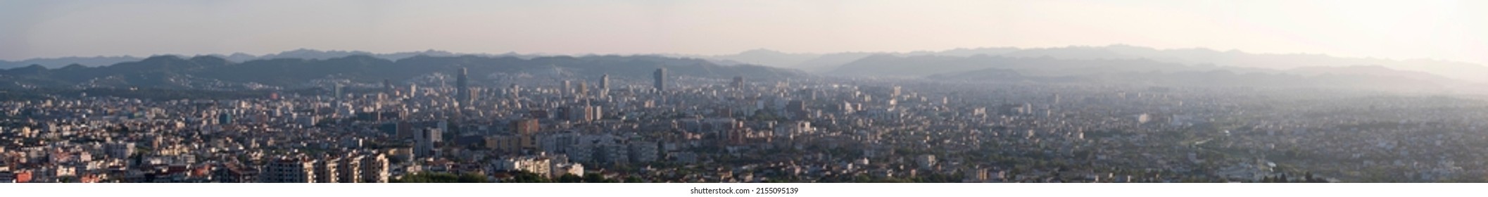 albania tirana city long panoramic view in sunset time, view from north - Shutterstock ID 2155095139