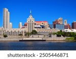 The Albany, New York skyline along the Hudson River waterfront is dominated by the historic SUNY building